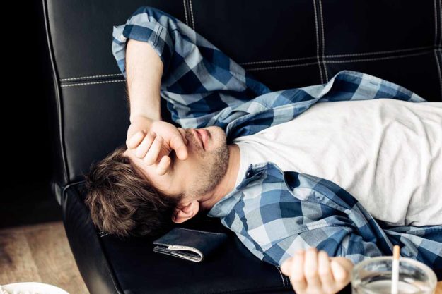 4 Signs of Opiate Addiction a man struggles with opiate addiction