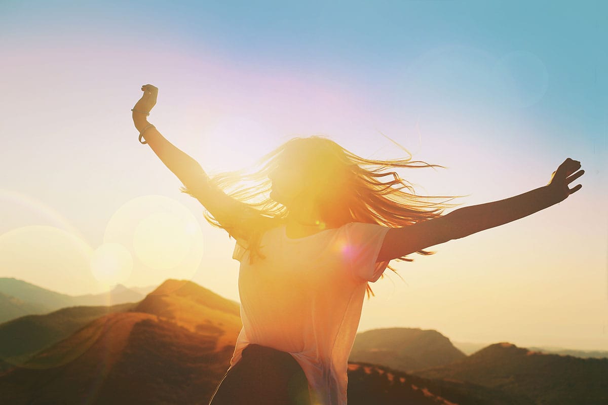 women moving in sunset thinking about new years resolution to get sober