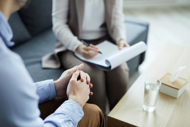5 Benefits of an Alcohol Addiction Treatment Program two people talking about 5 Benefits of an Alcohol Addiction Treatment Program